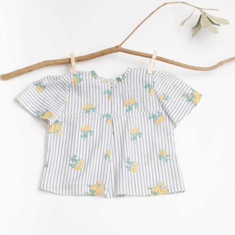 striped floral top with ivory shorts