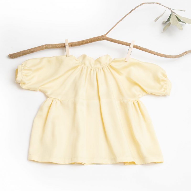 Yellow pansy top with a bell sleeve